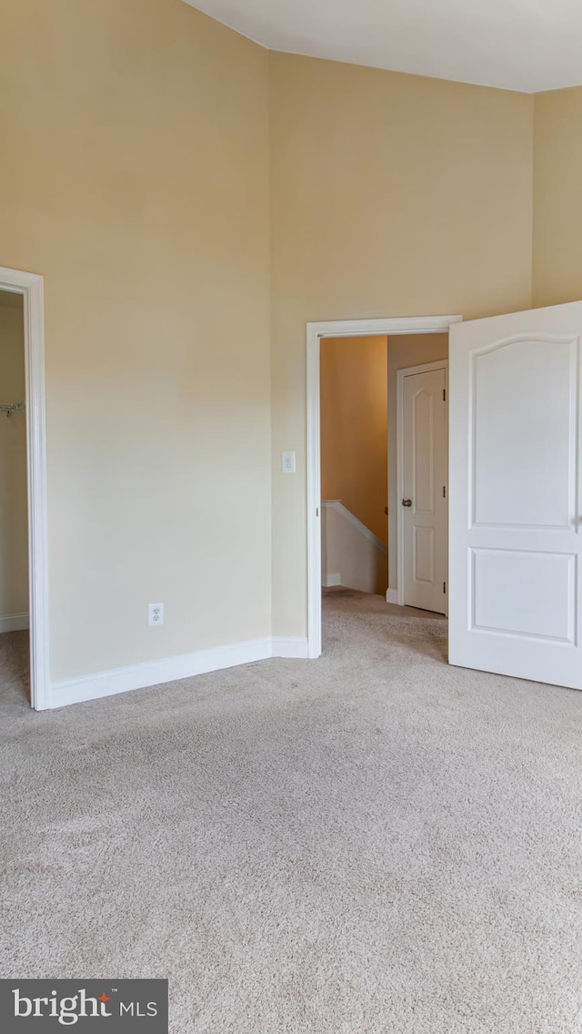 2080 Capstone Cir, Herndon, VA 20170 - unfurnished room with carpet floors, a high ceiling, and baseboards