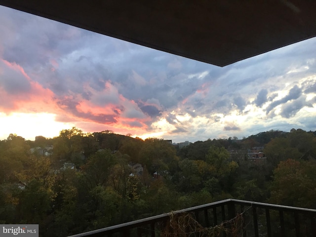 view of mountain feature featuring a view of trees