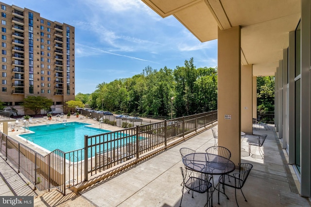 pool featuring a patio area