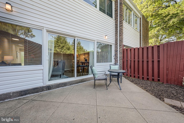 view of patio with fence