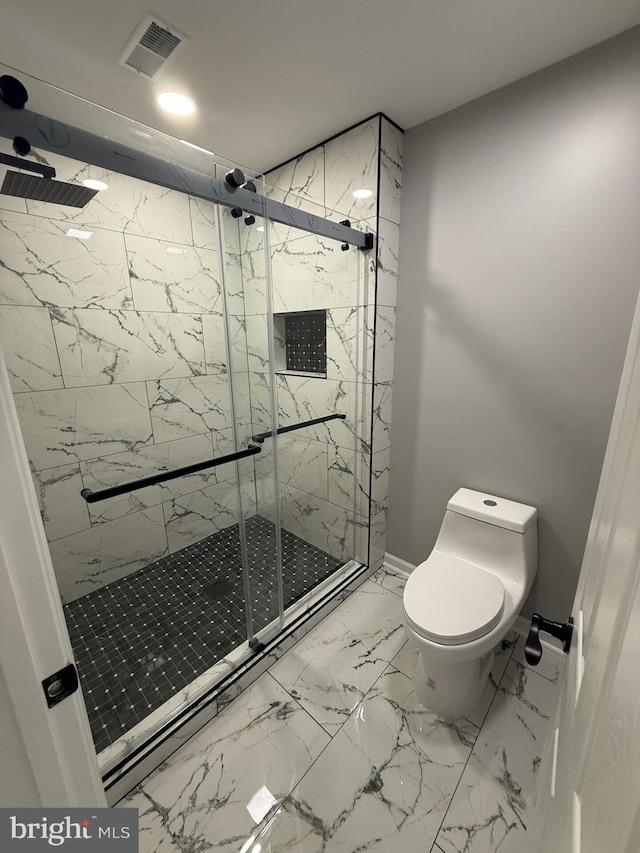 full bath featuring visible vents, marble finish floor, toilet, and a marble finish shower