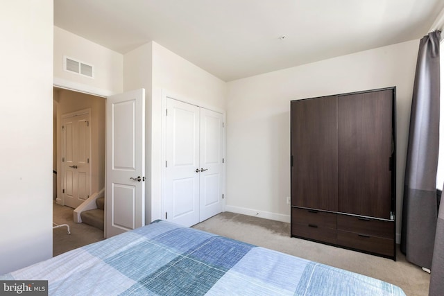 6645 Rhode Island Ave, Riverdale, MD 20737 - bedroom featuring baseboards, visible vents, and light colored carpet