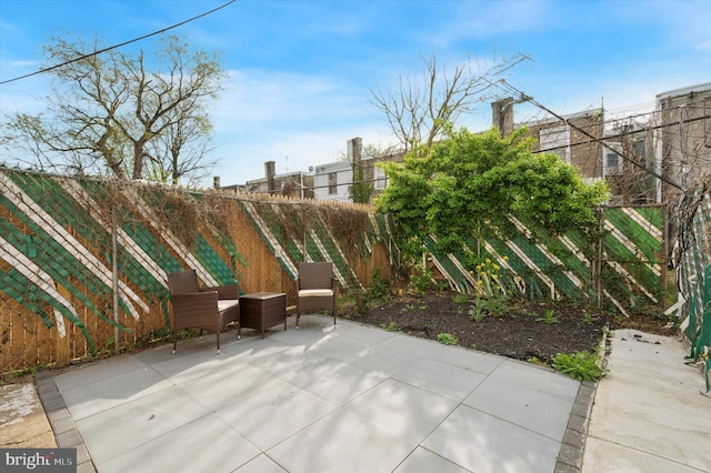view of patio with fence