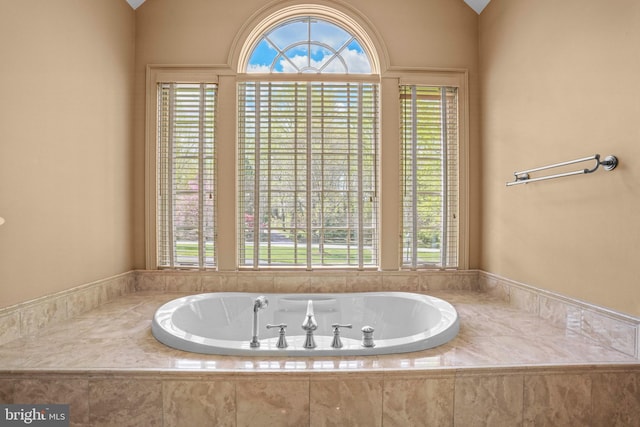 full bath featuring a garden tub
