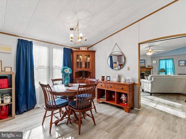 27689 Hartford Ct, Millsboro, DE 19966 - dining room with vaulted ceiling, a healthy amount of sunlight, wood finished floors, and ornamental molding