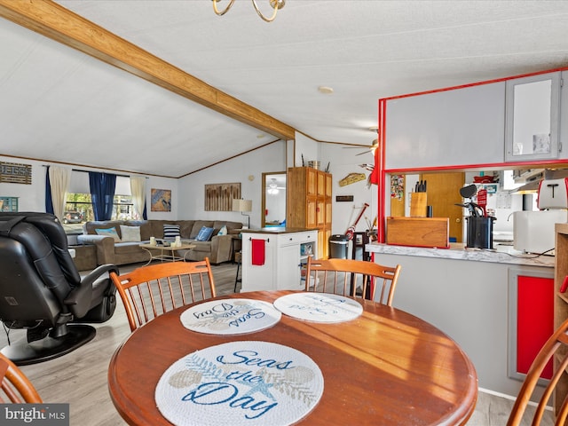 27689 Hartford Ct, Millsboro, DE 19966 - dining space with wood finished floors, ceiling fan, and lofted ceiling with beams