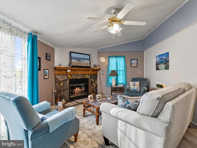27689 Hartford Ct, Millsboro, DE 19966 - living room with vaulted ceiling, a healthy amount of sunlight, a ceiling fan, and wood finished floors