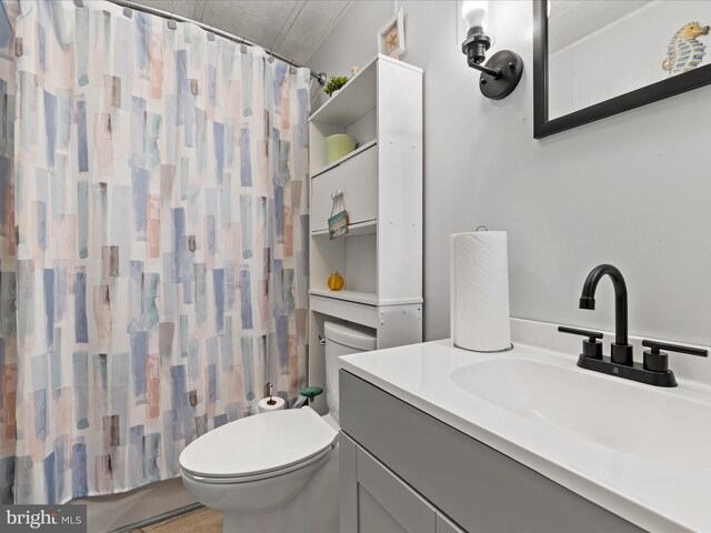 27689 Hartford Ct, Millsboro, DE 19966 - full bathroom with shower / tub combo with curtain, vanity, and toilet