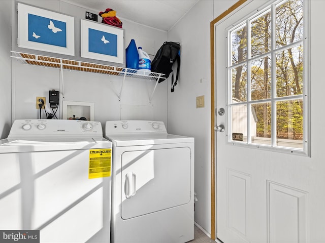 27689 Hartford Ct, Millsboro, DE 19966 - clothes washing area with washing machine and clothes dryer, laundry area, and a healthy amount of sunlight