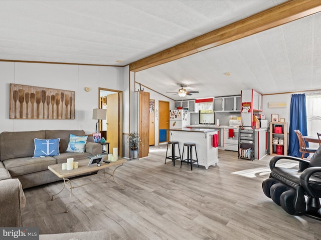 27689 Hartford Ct, Millsboro, DE 19966 - living area with light wood-type flooring, a ceiling fan, and lofted ceiling with beams