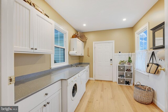 34844 Apple Pride Ct, Round Hill, VA 20141 - laundry room with recessed lighting, light wood finished floors, a sink, washer / dryer, and cabinet space