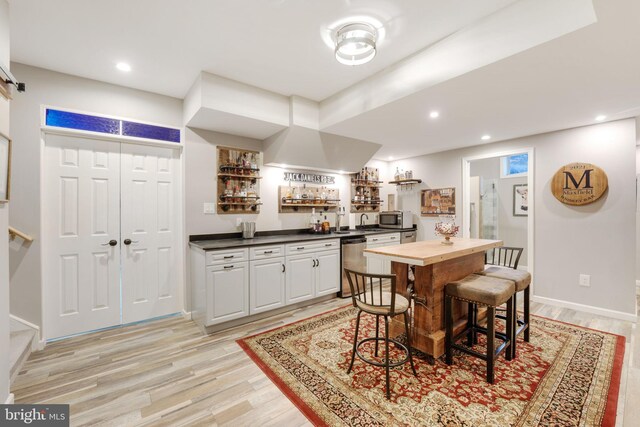 34844 Apple Pride Ct, Round Hill, VA 20141 - kitchen with recessed lighting, baseboards, light wood-style floors, white cabinets, and appliances with stainless steel finishes