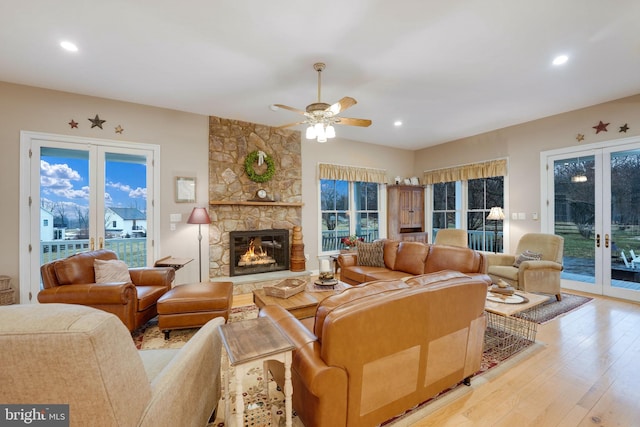 34844 Apple Pride Ct, Round Hill, VA 20141 - living area featuring plenty of natural light, french doors, a ceiling fan, and light wood-type flooring