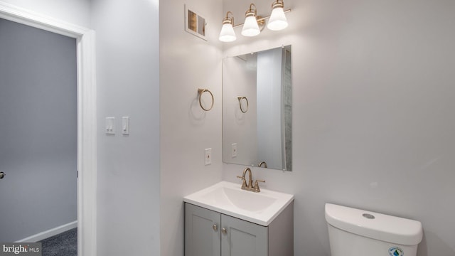 11400 Cosca Park Pl, Clinton, MD 20735 - half bathroom with vanity, visible vents, and toilet