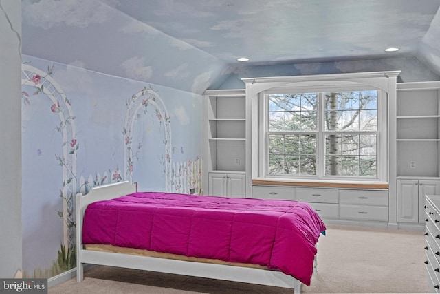 bedroom with carpet flooring and lofted ceiling
