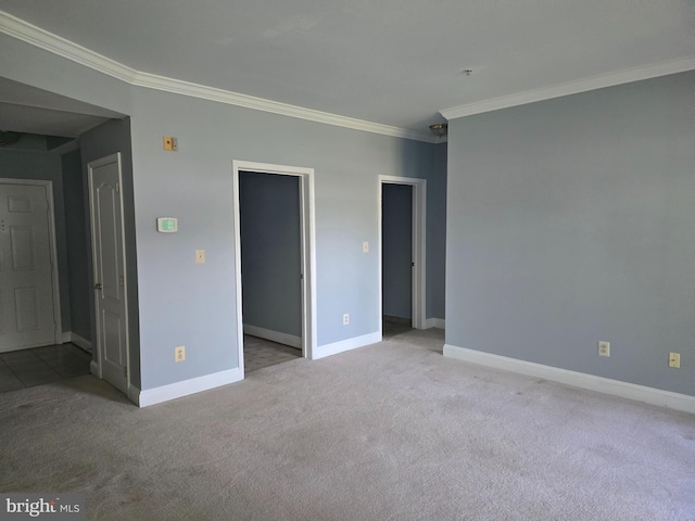 2100 Ganton Grn Unit B-104, Woodstock, MD 21163 - unfurnished room featuring crown molding, light colored carpet, and baseboards