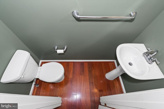bathroom with toilet and a sink