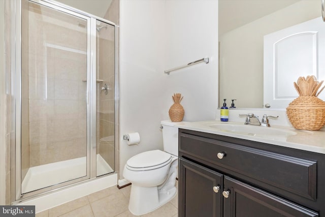full bathroom with toilet, a stall shower, tile patterned floors, and vanity