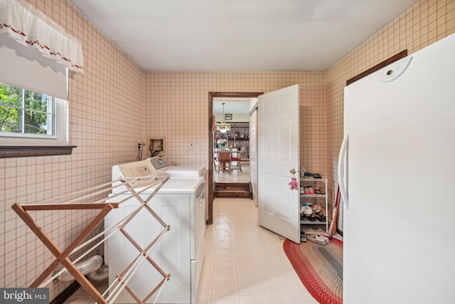 laundry room featuring independent washer and dryer