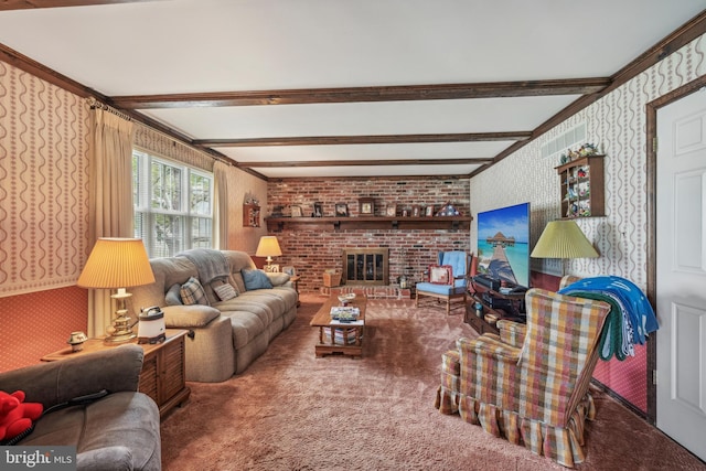 carpeted living room with wallpapered walls, beamed ceiling, a fireplace, and ornamental molding