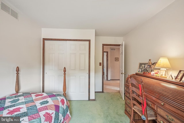 bedroom featuring light colored carpet