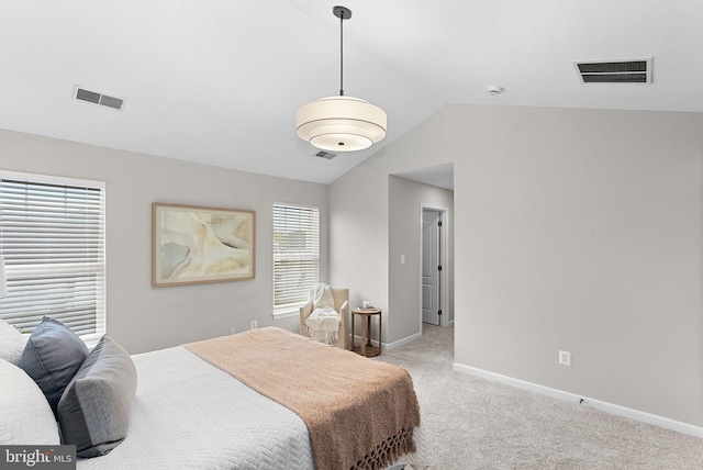 bedroom featuring visible vents, baseboards, vaulted ceiling, and light carpet