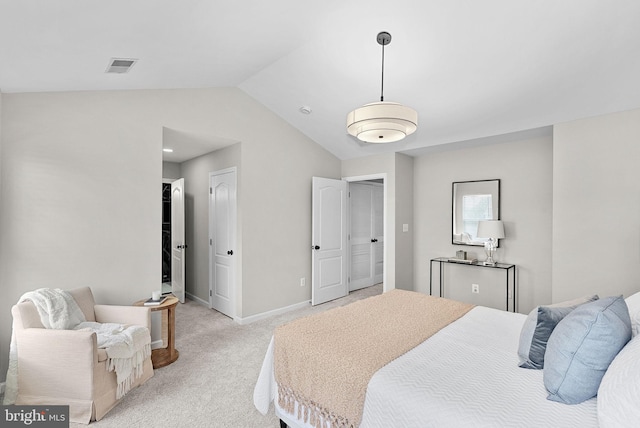 bedroom featuring baseboards, visible vents, light colored carpet, and vaulted ceiling