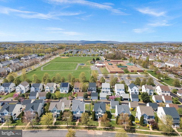 aerial view with a mountain view and a residential view