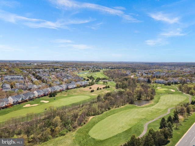 aerial view with view of golf course and a residential view