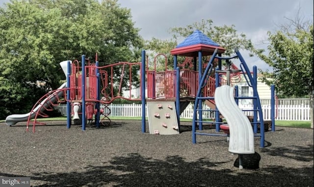 community playground featuring fence