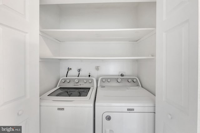 laundry room featuring laundry area and separate washer and dryer