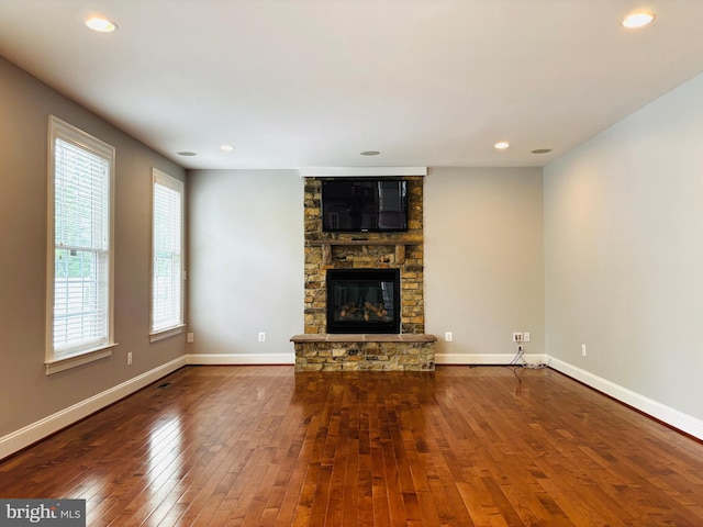8457 Amanda Pl, Vienna, VA 22180 - unfurnished living room with hardwood / wood-style flooring, a fireplace, recessed lighting, and baseboards
