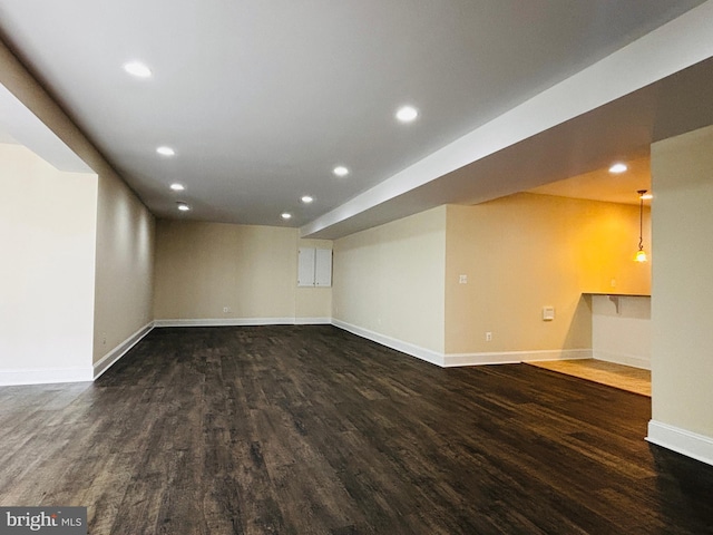 8457 Amanda Pl, Vienna, VA 22180 - unfurnished living room with recessed lighting, baseboards, and dark wood-style floors