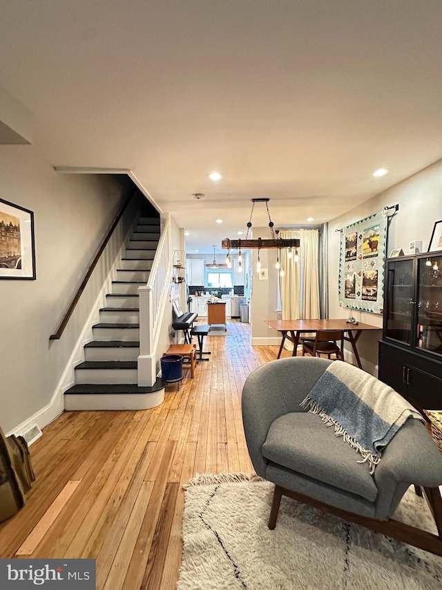 622 Saint Joseph St, Lancaster, PA 17603 - living room featuring recessed lighting, baseboards, hardwood / wood-style floors, and stairway