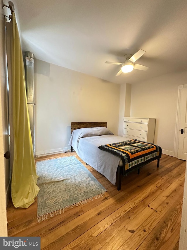 622 Saint Joseph St, Lancaster, PA 17603 - bedroom with baseboards, ceiling fan, and wood-type flooring
