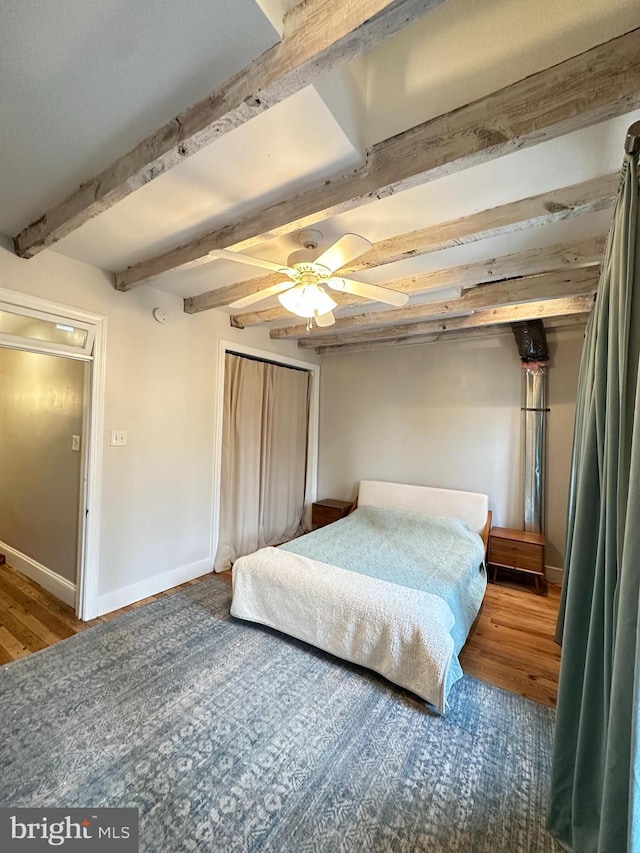 622 Saint Joseph St, Lancaster, PA 17603 - bedroom featuring baseboards, wood finished floors, beam ceiling, and a closet