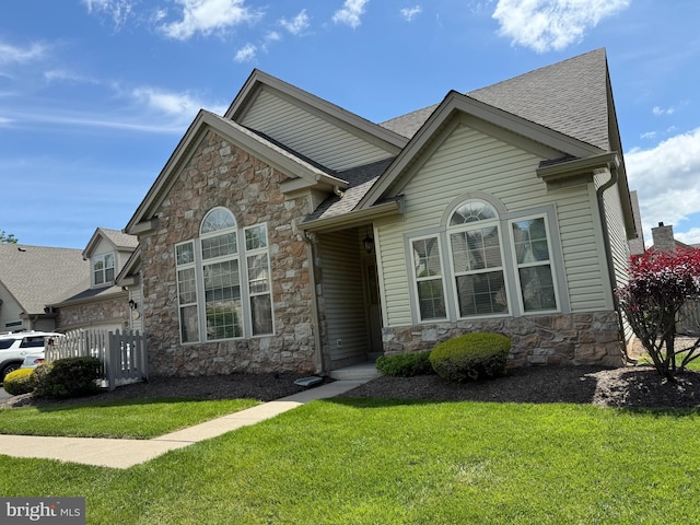 61 Legacy Oaks Dr, Richboro, PA 18954 - view of front of property with stone siding and roof with shingles