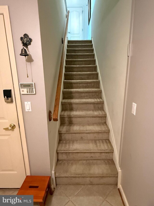61 Legacy Oaks Dr, Richboro, PA 18954 - staircase featuring tile patterned floors and baseboards