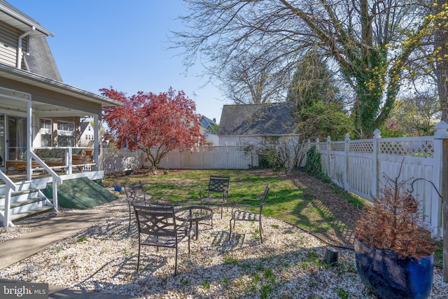 view of yard with a fenced backyard and a patio