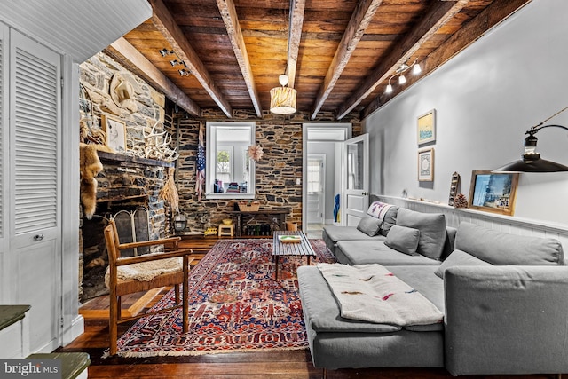 living room with wood ceiling, wood-type flooring, rail lighting, and beam ceiling