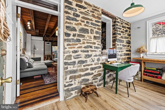 office with wood ceiling and wood finished floors