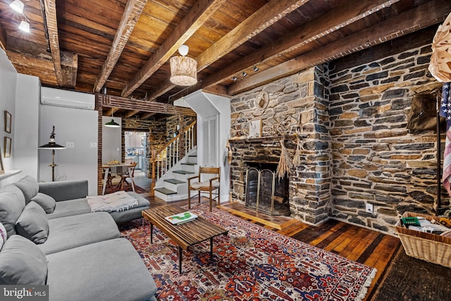 living room with stairway, an AC wall unit, beamed ceiling, wooden ceiling, and wood-type flooring
