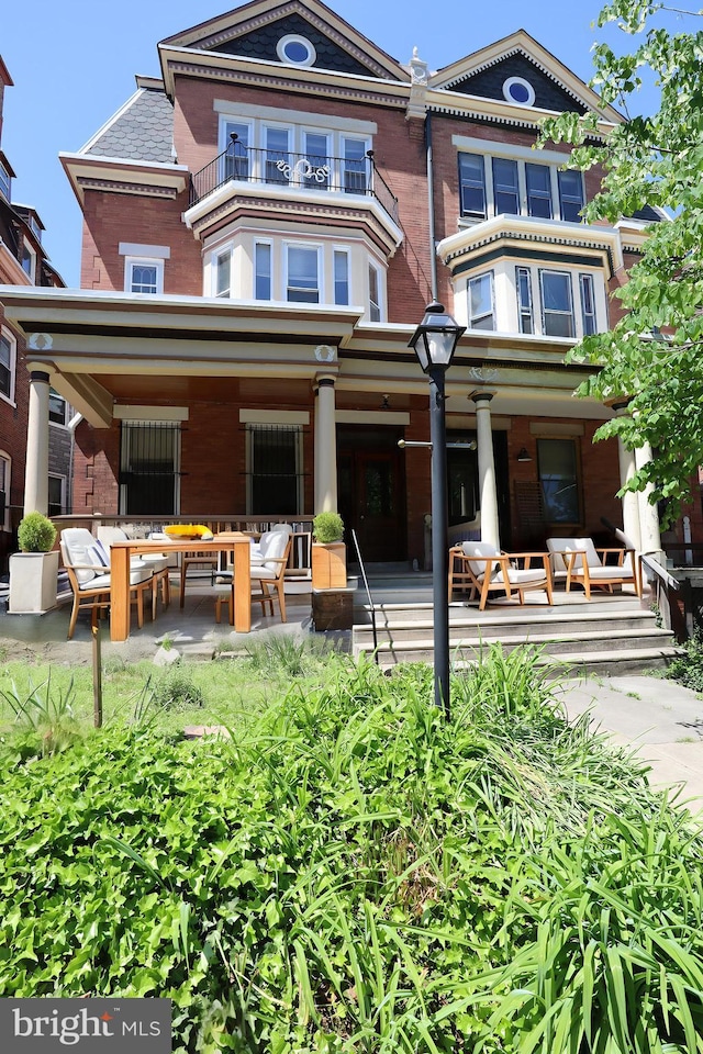 4505 Chester Ave, Philadelphia, PA 19143 - rear view of house featuring brick siding