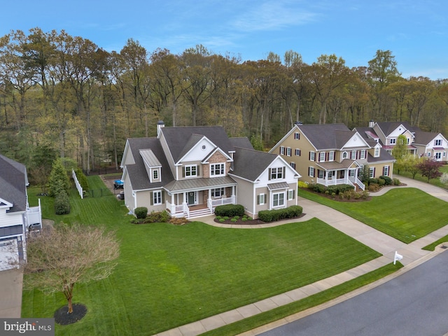 bird's eye view with a view of trees