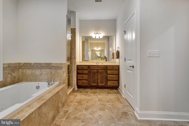 full bathroom featuring vanity, a stall shower, visible vents, and a tub with jets