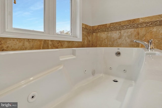 bathroom featuring a jetted tub