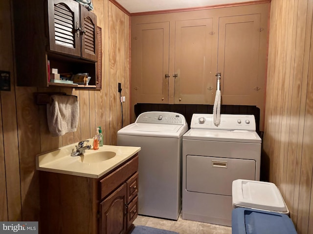 133 Black St, Howard, PA 16841 - laundry room with washing machine and clothes dryer, wood walls, and a sink