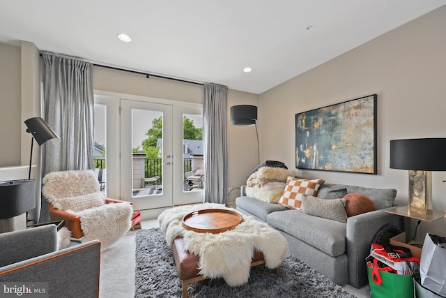 living room featuring french doors and recessed lighting
