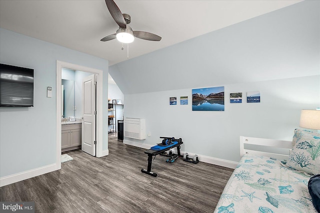 14626 Blue Heron Dr, Ocean View, DE 19970 - bedroom with dark wood-style floors, baseboards, ensuite bath, ceiling fan, and lofted ceiling