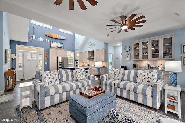 14626 Blue Heron Dr, Ocean View, DE 19970 - living room featuring ceiling fan, a high ceiling, and wood finished floors